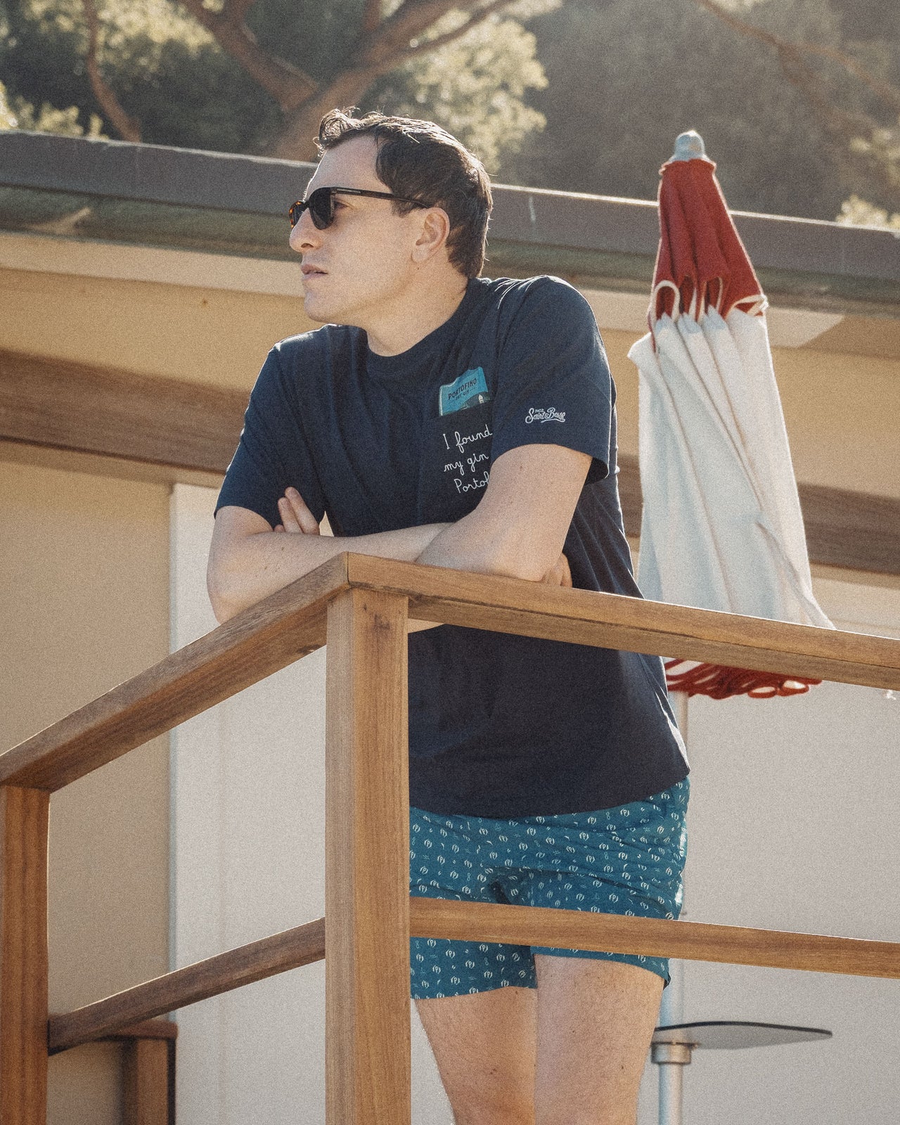 MONOGRAM SWIM SHORTS .
